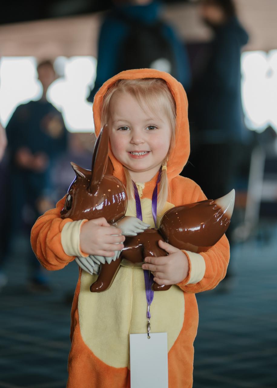 Young attendee in Eevee costume at The Lab Con