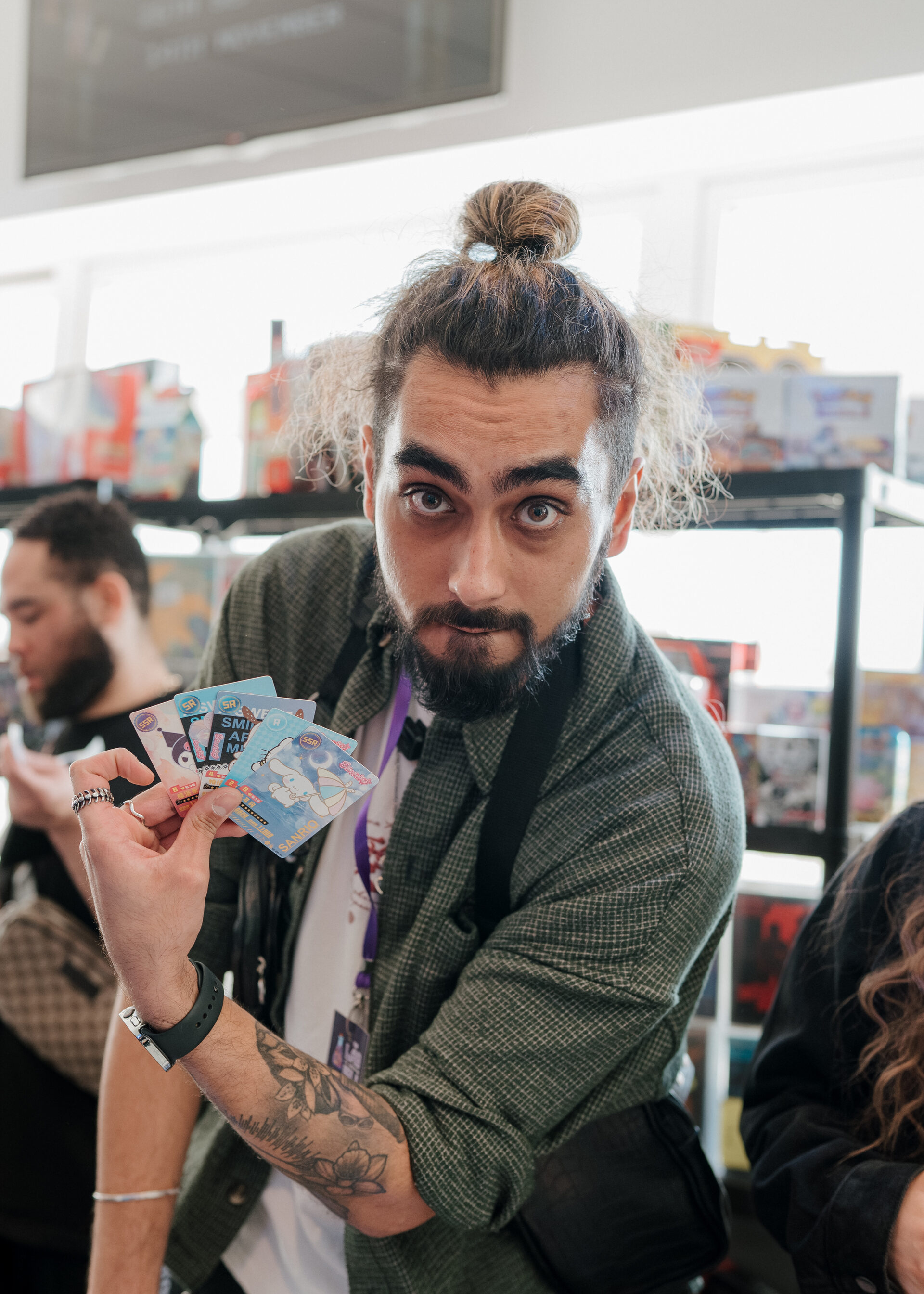 Attendee showing off his card finds
