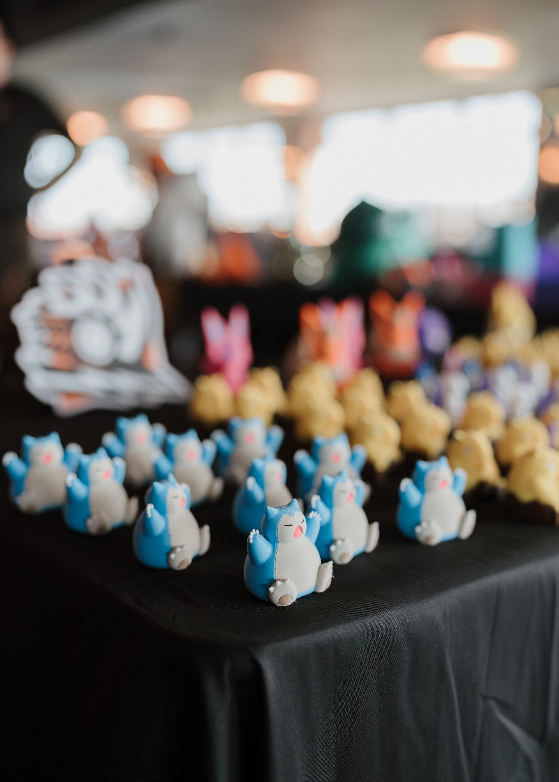 Snorlax figures at a vendor stall