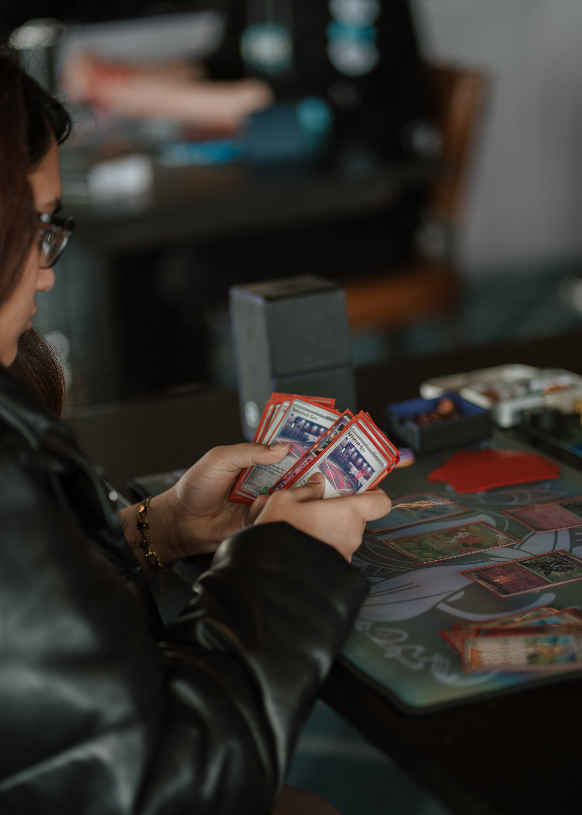 Player holding a hand of cards